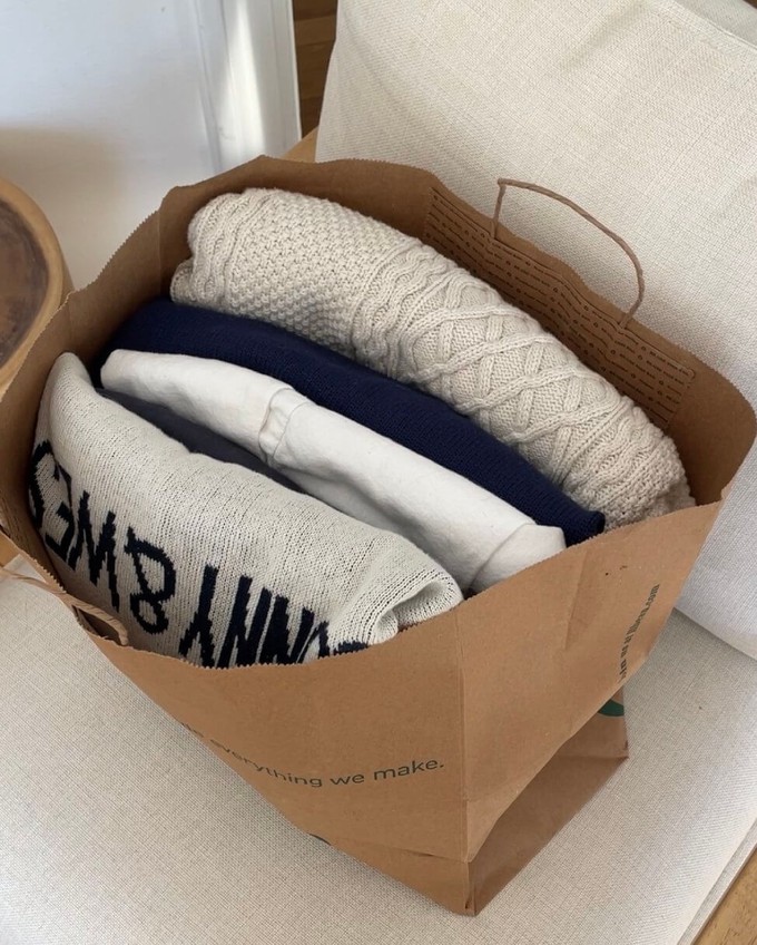 Bag of clothes being shared as part of community fashion