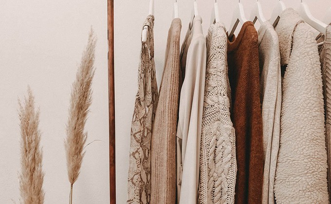 A tidy closet with sustainable fashion clothes