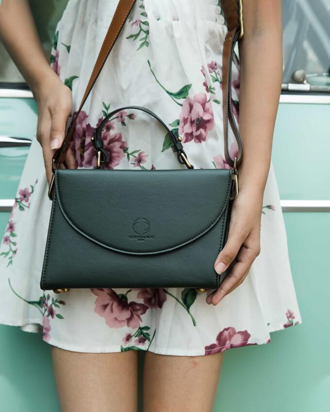 An ethical crossbody bag as a sustainable summer essential
