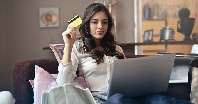 Consumer about to buy clothes they don't need