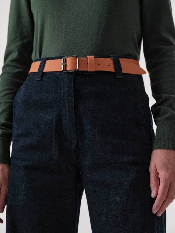 Consumer wearing one of the best sustainable belts