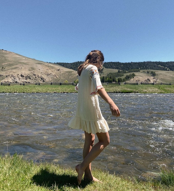 Consumer wearing sustainable vegan clothes in nature