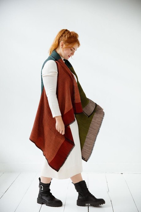 Consumer wrapped in a warm scarf as a sustainable winter essential