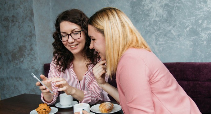 Family members having a conversation around fast fashion clothes as presents