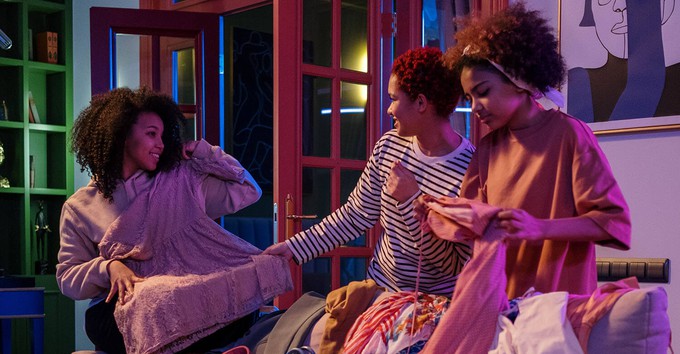Gen z friends passionate about sustainable fashion