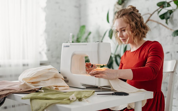 Sustainable fashion garment worker sewing