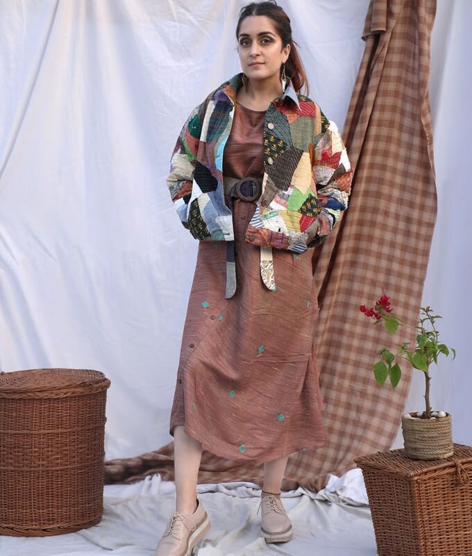 Model styling a dress in different ways with a hat