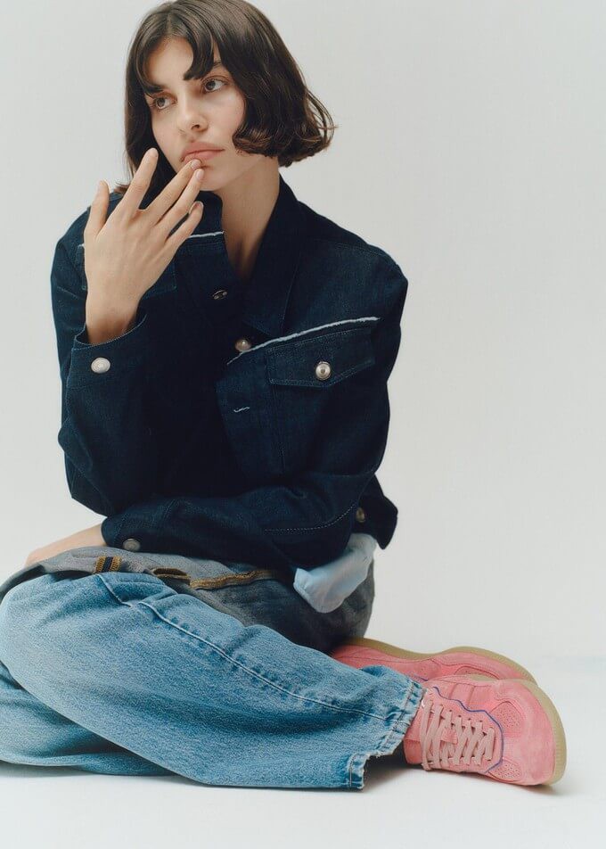 Model wearing shoes that can be a more ethical alternative to Primark