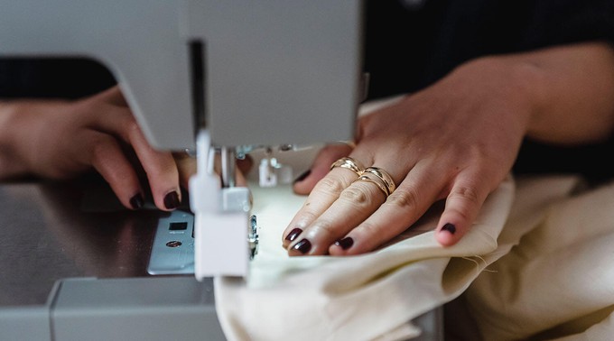 Person sewing clothes