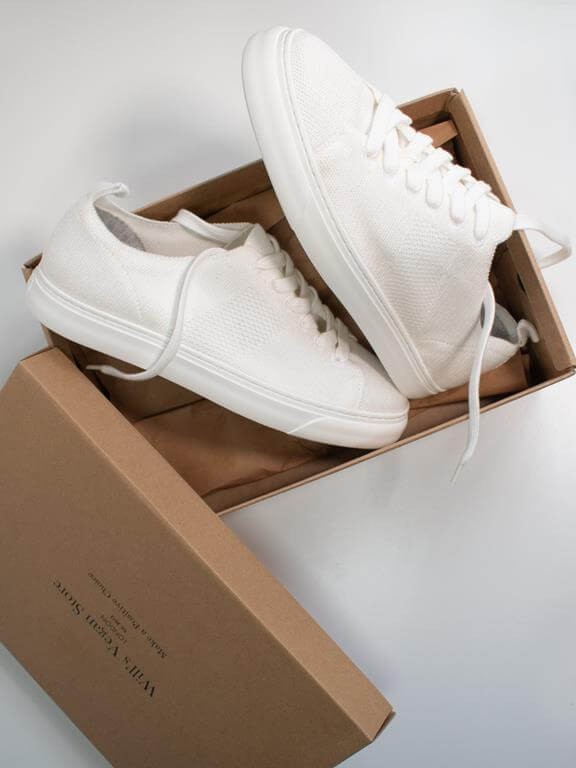 Versatile white trainers for a spring capsule