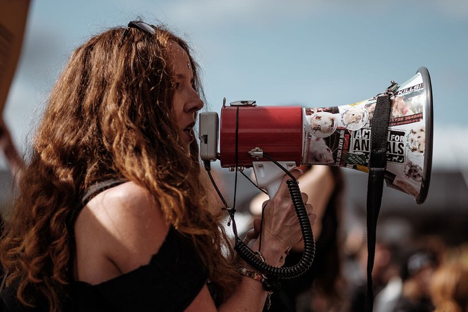 Woman holding a megaphone during a protest