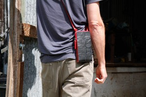 Crossbody pouch | Leather & Fire-hose from Elvis & Kresse