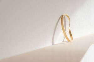 Swirling wind bangle bracelet gold plated from Julia Otilia