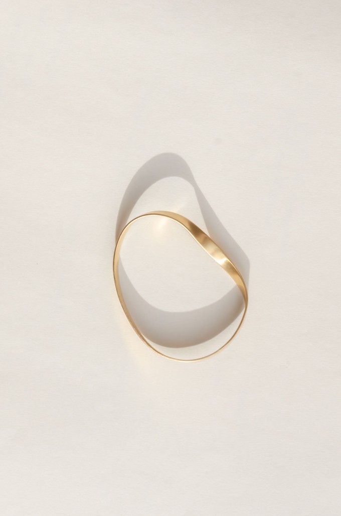 Swirling wind bangle bracelet gold plated from Julia Otilia