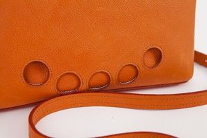 CLOSE clutch orange from Marlene Fernandez