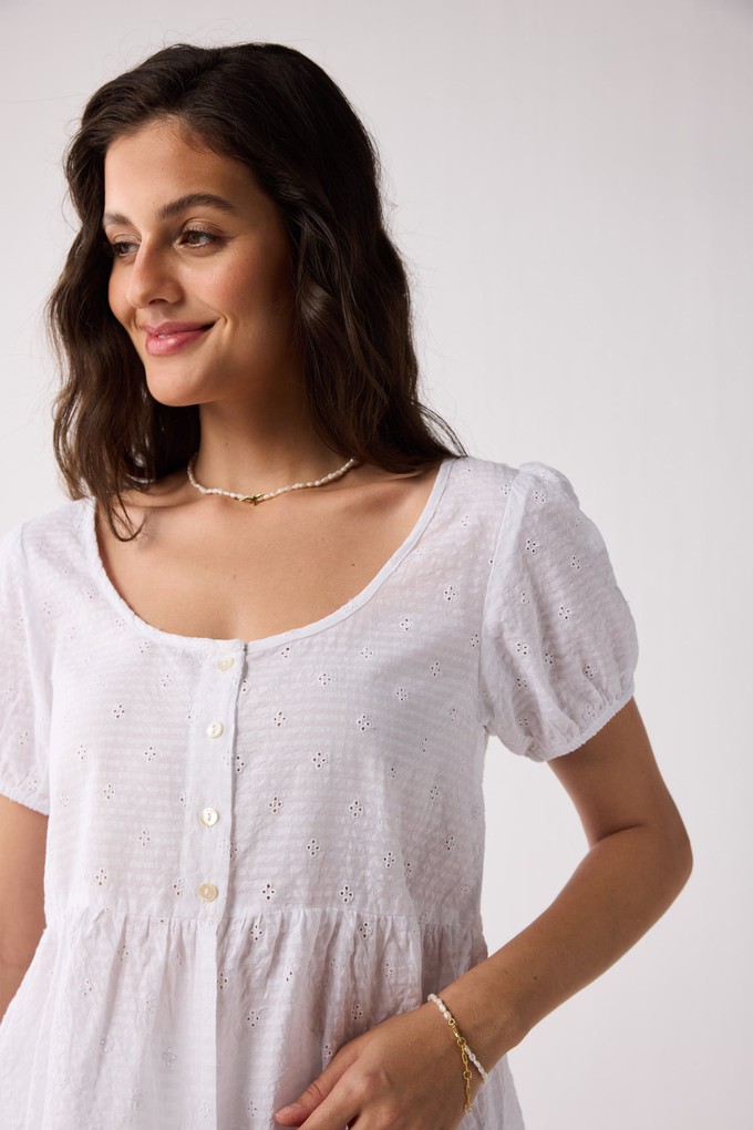 Embroidered Peplum Top with Puff Sleeves in White from Reistor