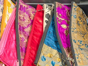 Colourful quilted upcycled sari pouches from Shakti.ism