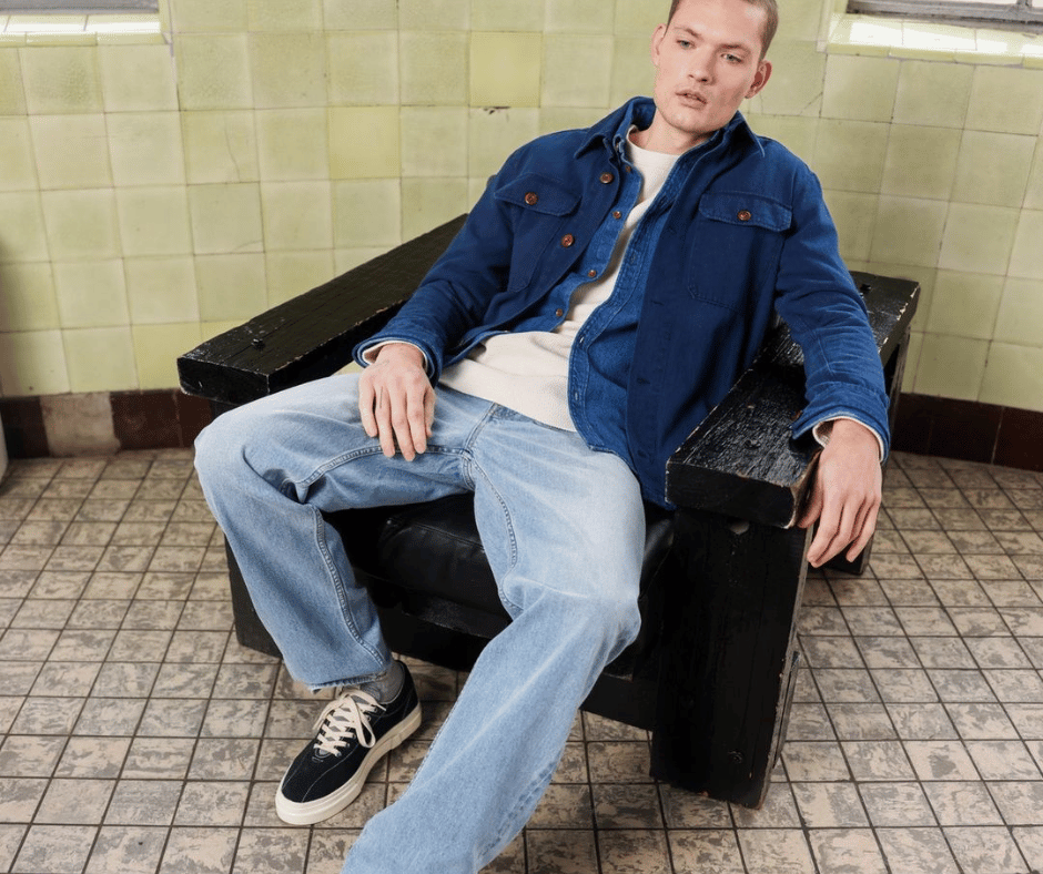 Consumer wearing an outfit by one of the most sustainable jeans and streetwear brands