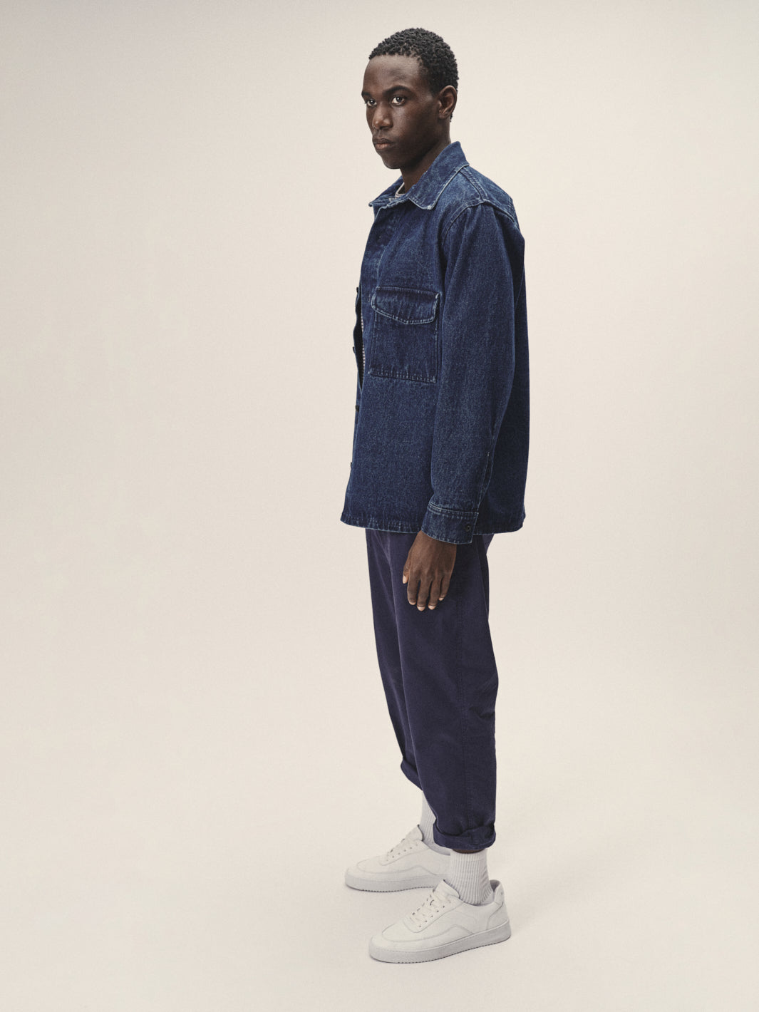 Consumer wearing sustainable streetwear sweatpants