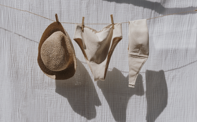 Example of freshly washed sustainable swimwear hanging on a line