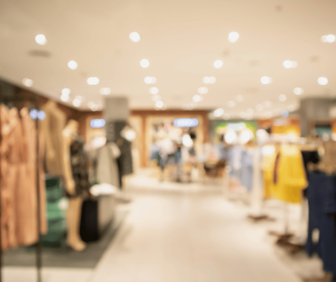Consumer carrying several shopping bags after falling for these common psychological tricks